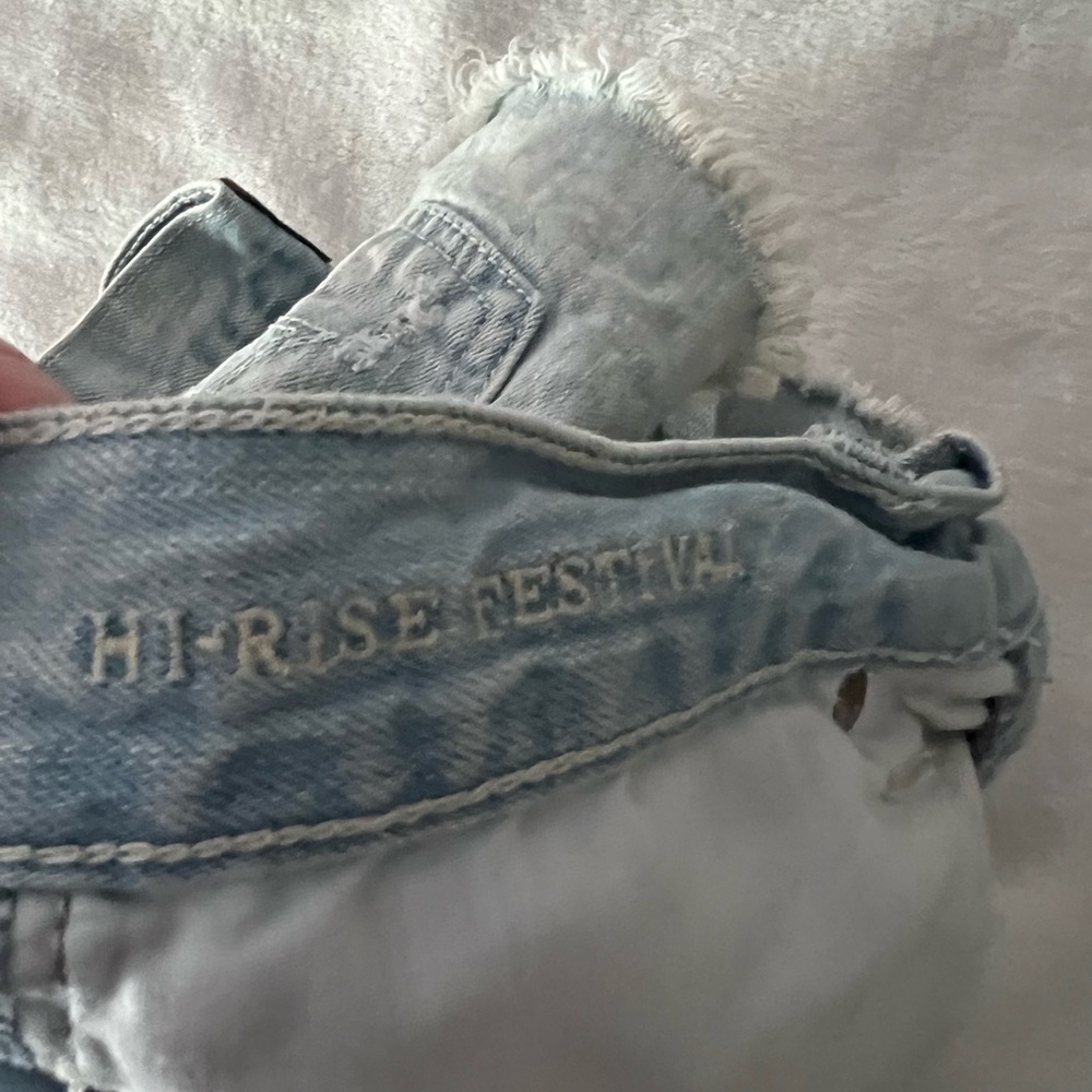 American Eagle Outfitters Light Wash Distressed Denim Cutoff Shorts - Picture 11 of 12
